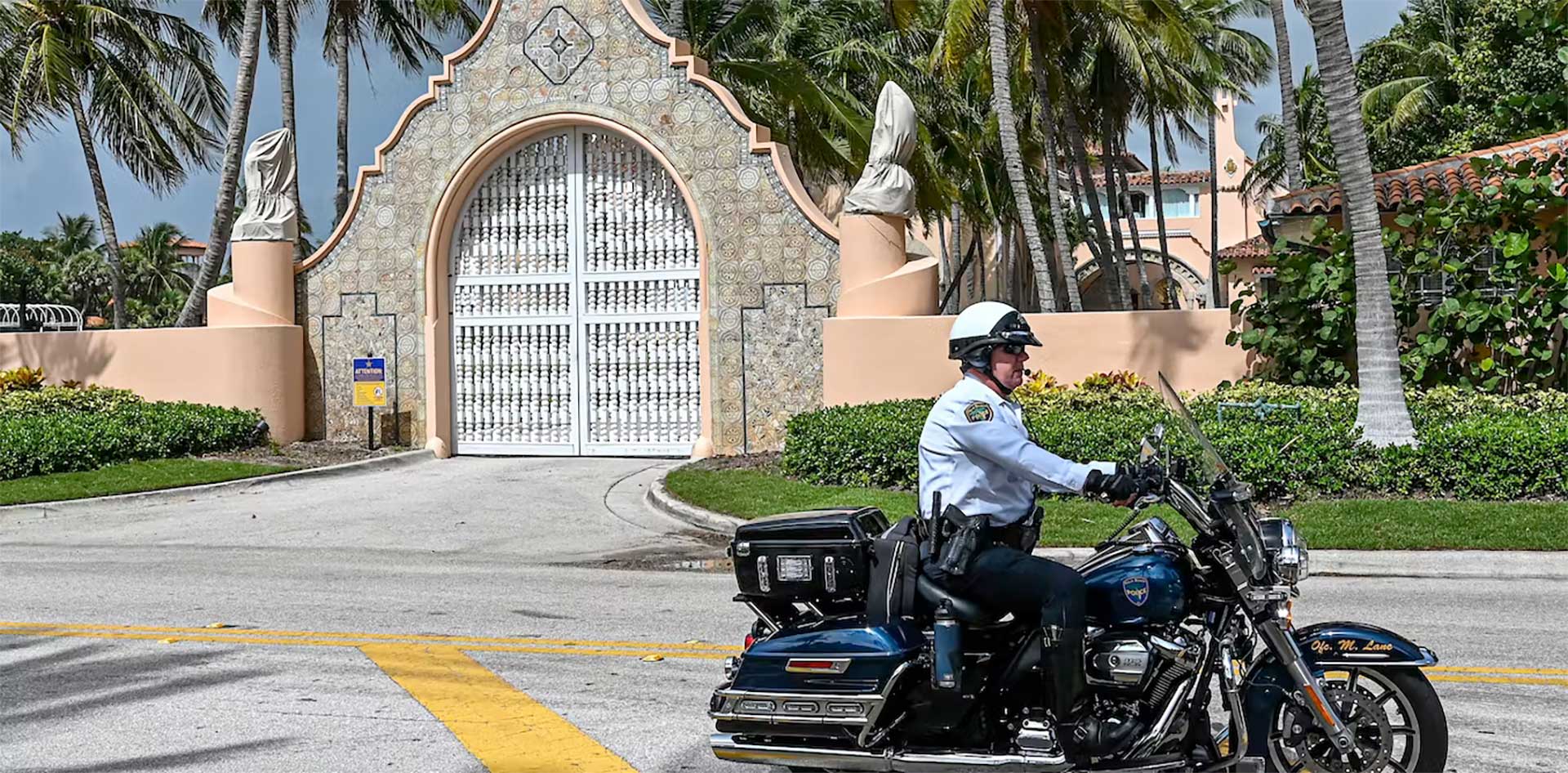 A police officer drives by Mar-a-Lago on August 9, 2022. Giorgio Viera/AFP via Getty Images